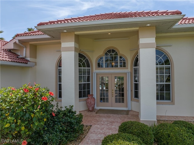 doorway to property featuring french doors