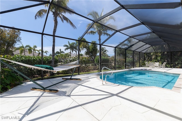 view of pool featuring a patio and a lanai