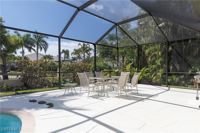 view of patio / terrace with glass enclosure