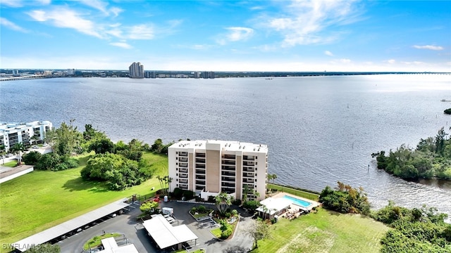 birds eye view of property featuring a water view