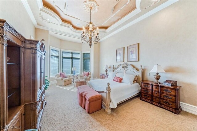 carpeted bedroom featuring a towering ceiling, a tray ceiling, an inviting chandelier, and crown molding