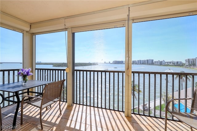 sunroom with a water view