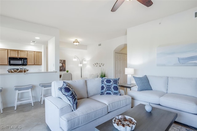 living room featuring ceiling fan