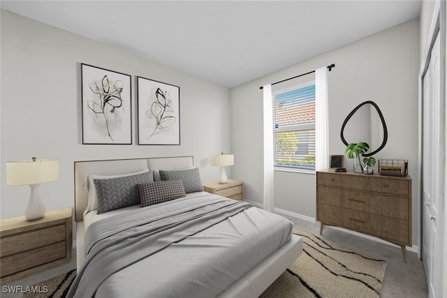 bedroom featuring light colored carpet