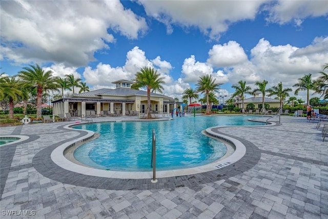 view of swimming pool featuring a patio area