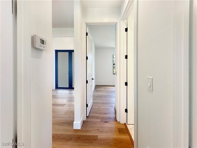 hall featuring light hardwood / wood-style floors