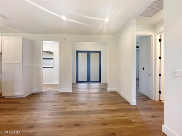 foyer with light wood-type flooring