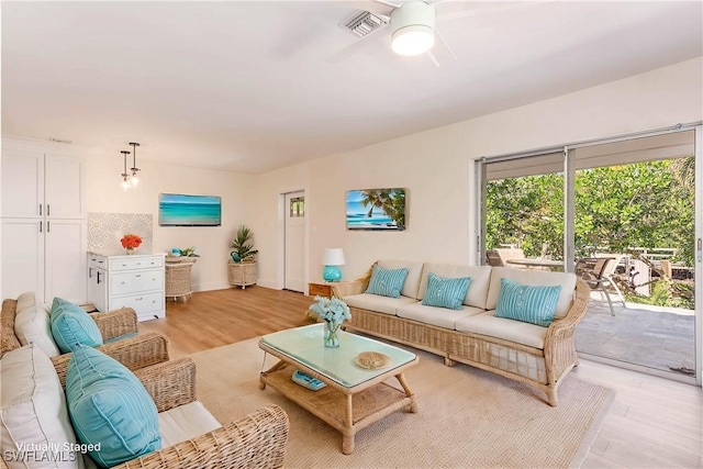 living room with light hardwood / wood-style flooring