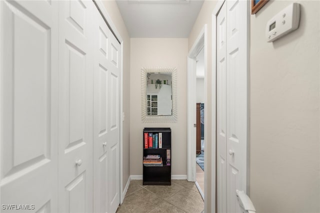1744 SW 15th St, Cape Coral, FL 33991 - corridor with baseboards and light tile patterned flooring