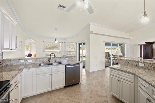 kitchen with white cabinets, appliances with stainless steel finishes, ornamental molding, and sink