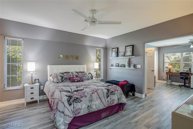 bedroom featuring ceiling fan and light wood-type flooring