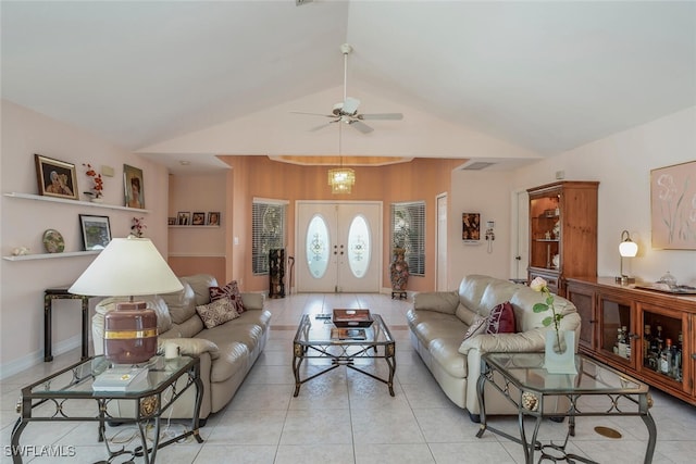 tiled living room featuring french doors, vaulted ceiling, and ceiling fan