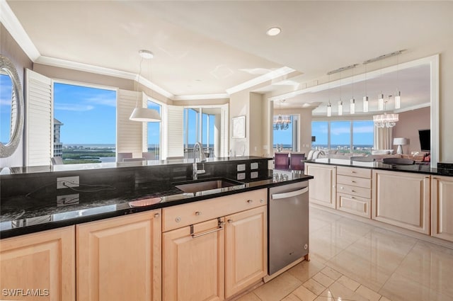 kitchen featuring dishwasher, a wealth of natural light, sink, and decorative light fixtures