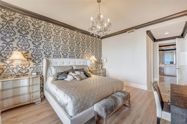 bedroom with a chandelier, light hardwood / wood-style floors, and crown molding