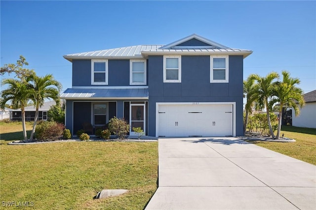 3507 SW 15th Ave, Cape Coral, FL 33914 - view of front facade featuring a standing seam roof, a metal roof, a front yard, and driveway