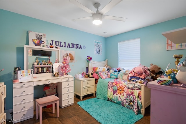 bedroom featuring ceiling fan and dark hardwood / wood-style flooring