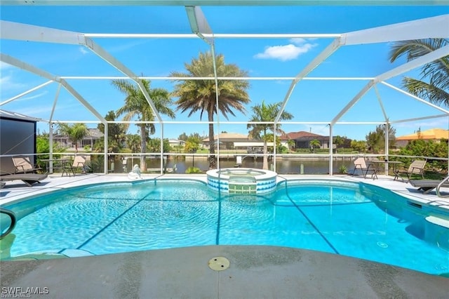 view of swimming pool with a lanai, a water view, and a patio