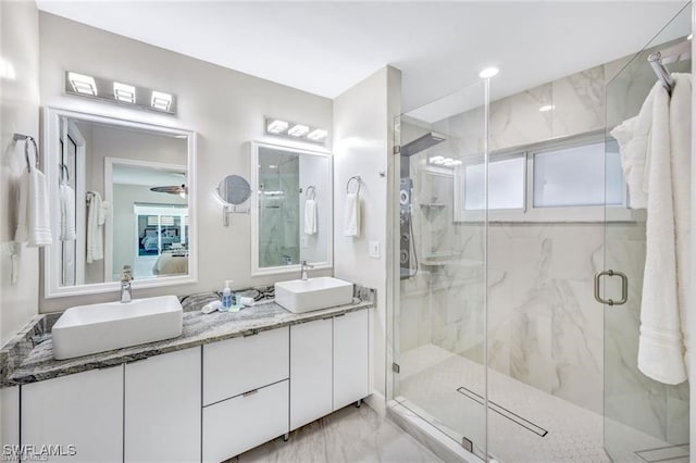 bathroom with vanity and walk in shower