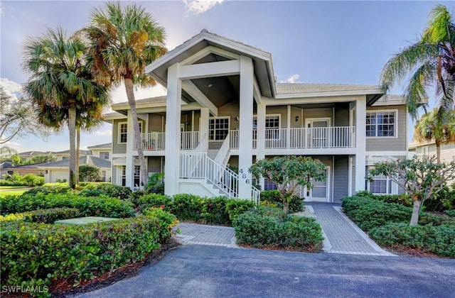 486 Edgemere Way E Unit 2-3, Naples, FL 34105 - view of building exterior with stairs