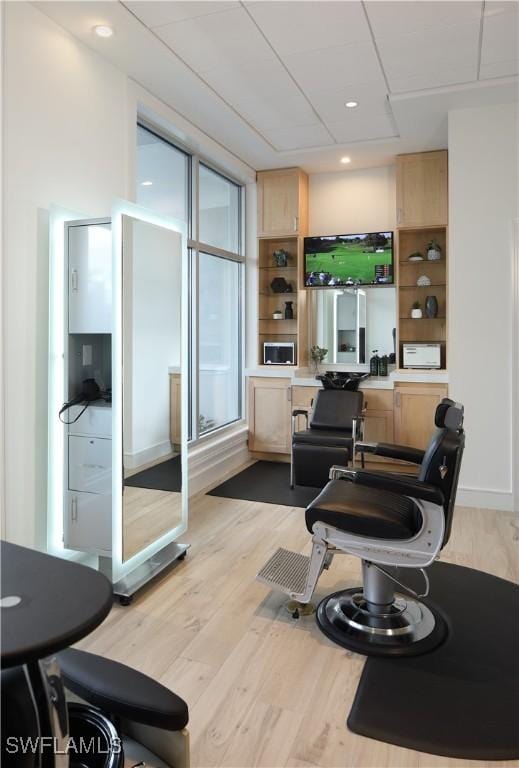486 Edgemere Way E Unit 2-3, Naples, FL 34105 - exercise room featuring light wood-type flooring