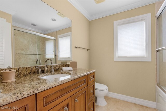 bathroom with tile patterned floors, vanity, ornamental molding, and toilet