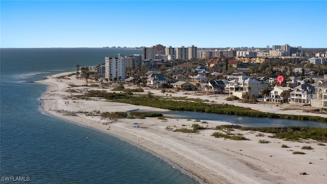 drone / aerial view with a view of the beach and a water view