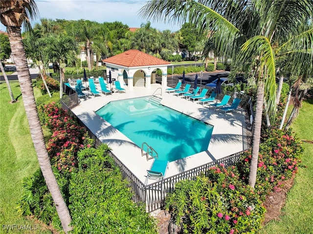 view of swimming pool featuring a patio