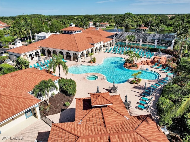 view of swimming pool with a patio