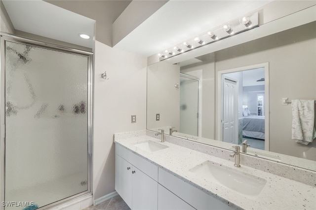 bathroom featuring vanity and walk in shower