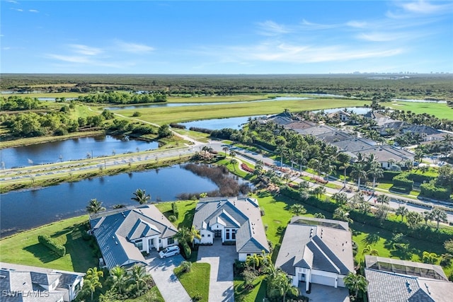 bird's eye view with a water view