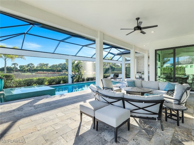 view of patio with ceiling fan, an outdoor living space, a swimming pool with hot tub, and glass enclosure