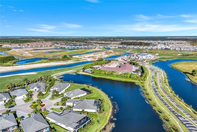 drone / aerial view featuring a water view