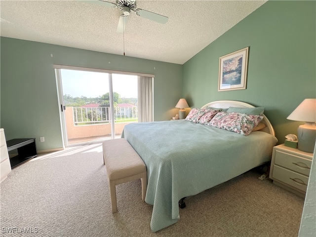 carpeted bedroom featuring a textured ceiling, access to outside, vaulted ceiling, and ceiling fan