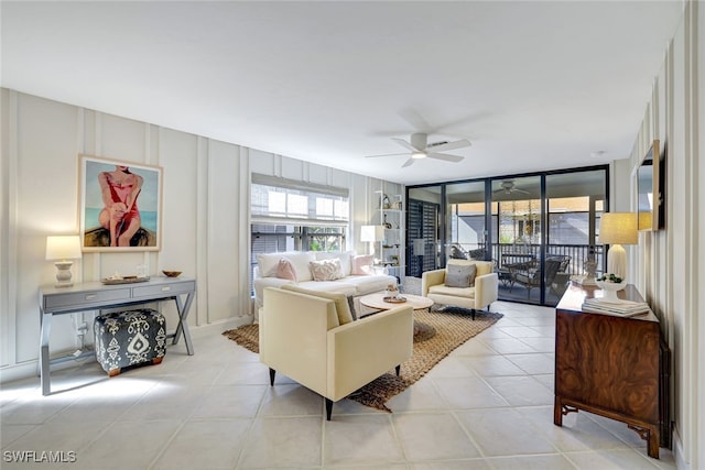 tiled living room featuring ceiling fan