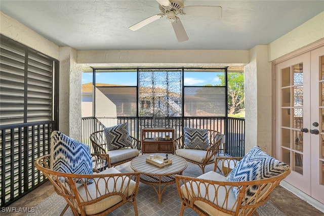 sunroom with french doors, ceiling fan, and a healthy amount of sunlight