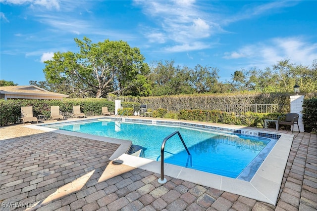 view of pool with a patio area