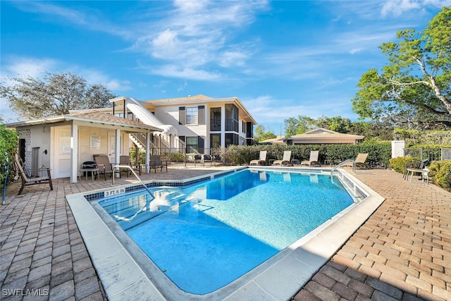 view of pool with a patio area