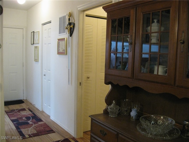 hall featuring hardwood / wood-style floors