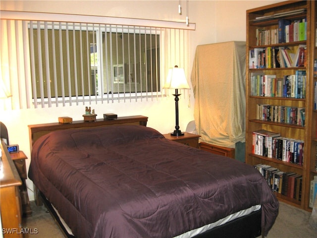 bedroom featuring carpet