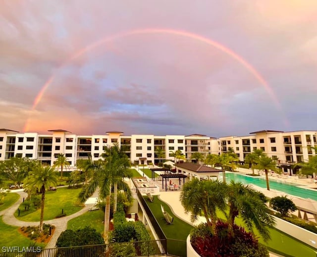 1111 Central Ave Unit 211, Naples, FL 34102 - view of community featuring a swimming pool