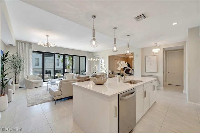 kitchen with white cabinetry, dishwasher, sink, an island with sink, and decorative light fixtures