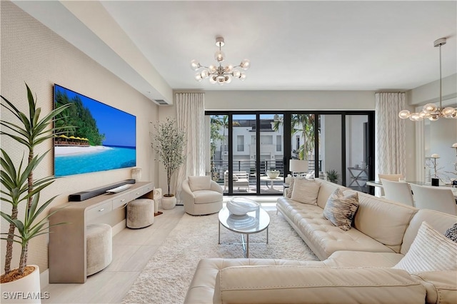 living room with light tile patterned floors and an inviting chandelier