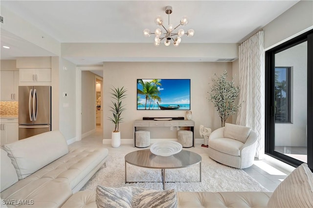 tiled living room with an inviting chandelier