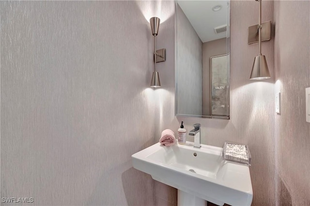 1111 Central Ave Unit 211, Naples, FL 34102 - bathroom featuring a sink