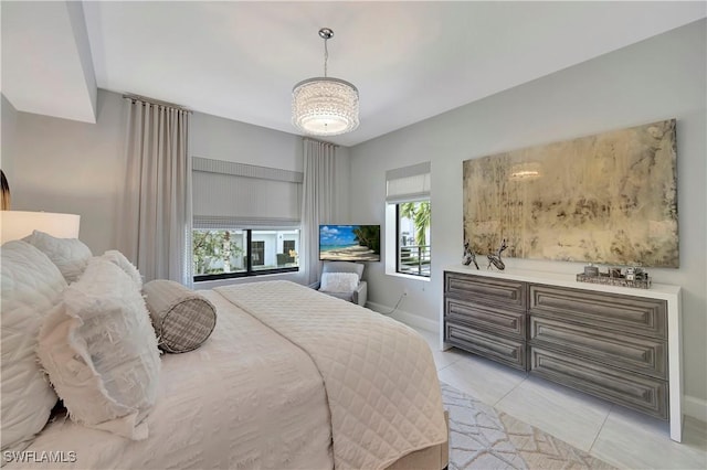 bedroom featuring light tile patterned floors