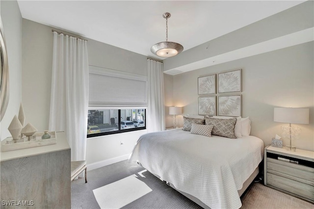 1111 Central Ave Unit 211, Naples, FL 34102 - bedroom featuring carpet flooring and baseboards