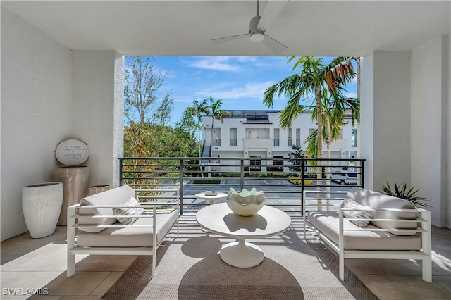 balcony featuring ceiling fan