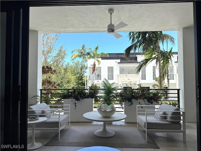 1111 Central Ave Unit 211, Naples, FL 34102 - balcony featuring a ceiling fan