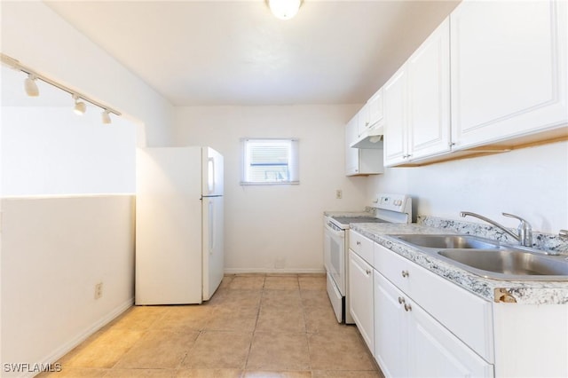 kitchen featuring white cabinets, light tile patterned flooring, white appliances, and sink