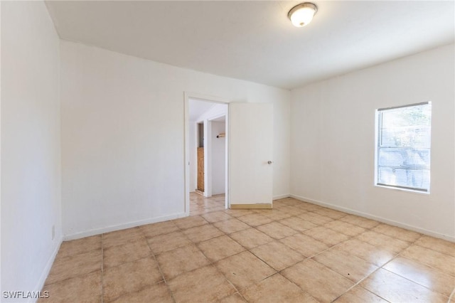 2428 Stella St, Fort Myers, FL 33901 - spare room with light tile patterned floors and baseboards